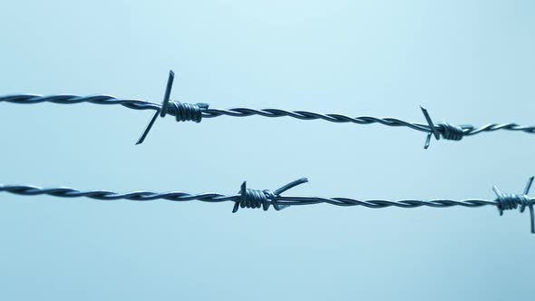 Passing Barbed Wire On Cloudy Day