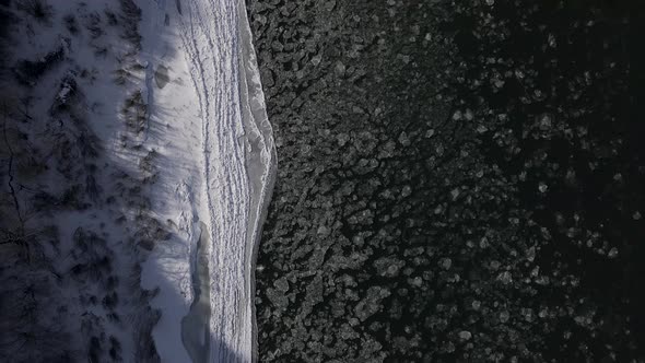 Aerial Drone Top Down Shot of a Frozen River