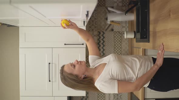 Girl Does Cleaning in the Kitchen