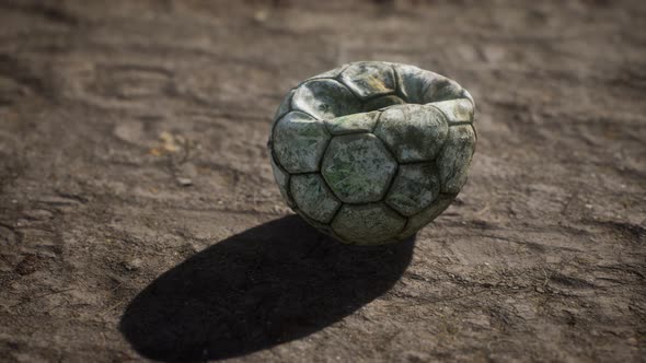 Old Soccer Ball the Cement Floor