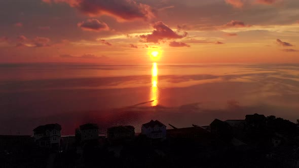 This cinematic drone shot was shot in Outer banks when the sun is just setting one the ocean