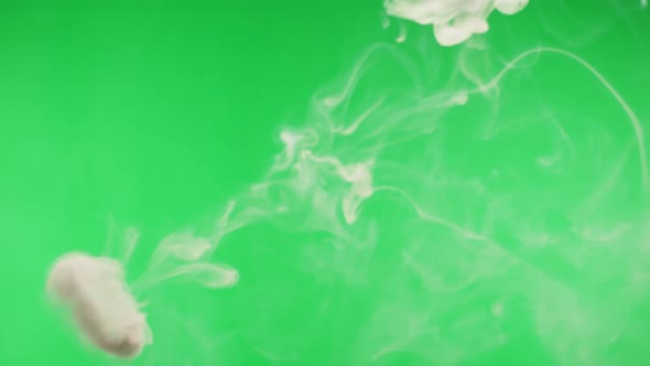 Smoke Rings on Green Chroma Key Background alt