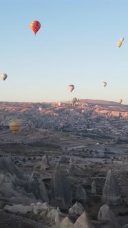 Vertical Video of Hot Air Balloons Flying in the Sky Over Cappadocia Turkey