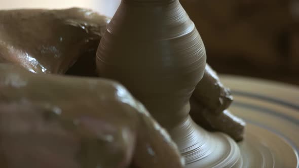Potter Making Ceramic Vase Close Up