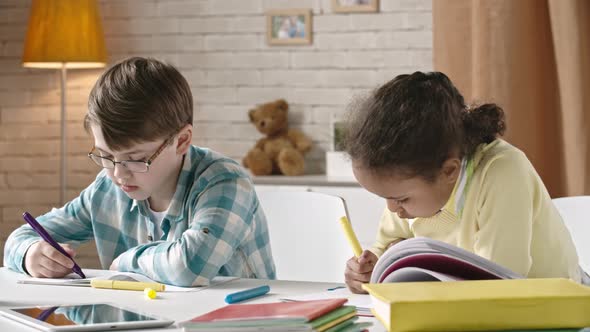 Kids Drawing at Desk alt