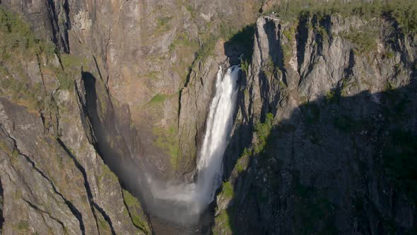 Drone shot orbiting Voringfossen waterfall in Hardangervidda, Norway