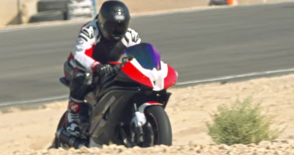 Slow motion of sport motorcycles making turns during a race