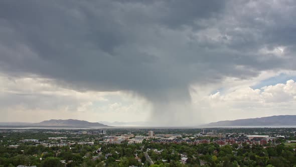 Rain storm moving over Provo city durning the hot summer