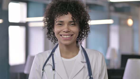 Portrait of Cheerful Young Professional Doctor Looking at the Camera and Smiling