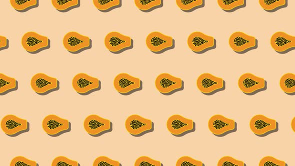 Papaya fruit slice in animated pattern on an orange background. Seamless loop food animation