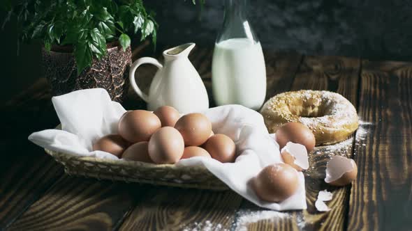 Sesame bun, milk and eggs in a basket