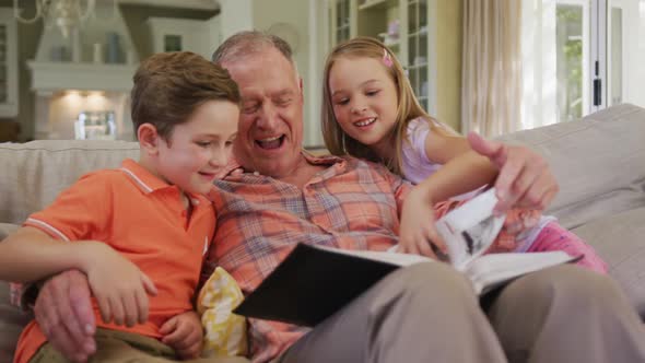 Senior Caucasian man with grandchildren