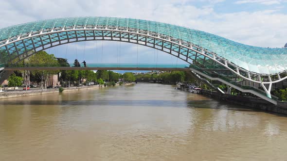 Fly Below Peace Bridge In Tbilisi