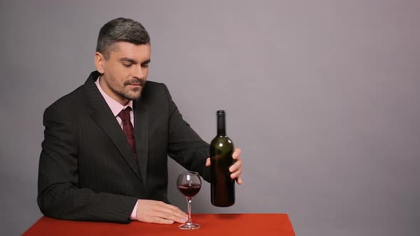 Male Winemaker Enjoying Perfect Taste of Red Wine Family Business Sommelier