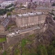 Drone View of the Cliff with Edinburgh Castle and the City in the Background - VideoHive Item for Sale