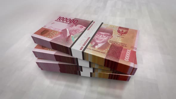 Indonesian Rupiah money banknote pile packs