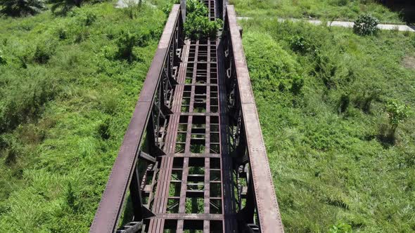 Century old solid black color wrought iron bridge