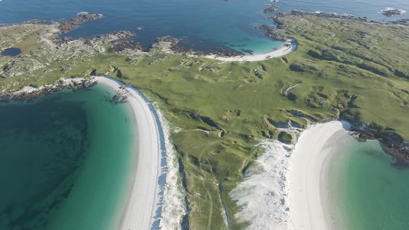 Flying Over The Dog's Bay Beach With The Gurteen Beach On A Sunny Summer Day By The Lush Green Meado