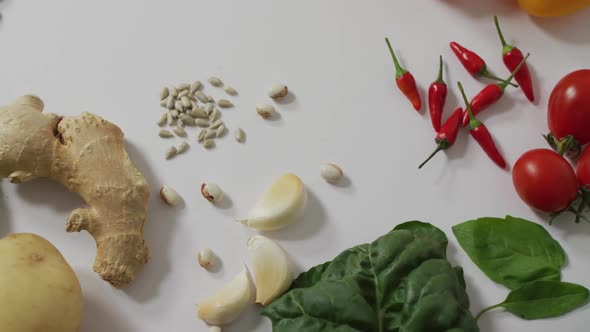 Video of fresh fruit and vegetables on white background