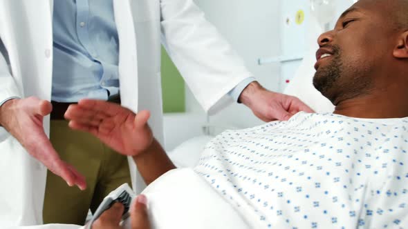 Doctor shaking hands with patient