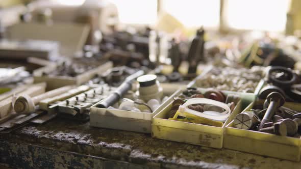 A Table with DIY Equipment in a Workshop - Closeup