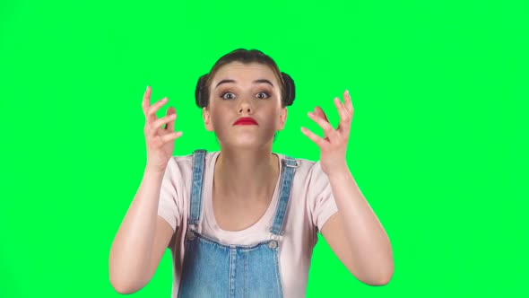 Woman Looking at Camera with Anticipation, Then Very Upset Against Green Screen. Slow Motion