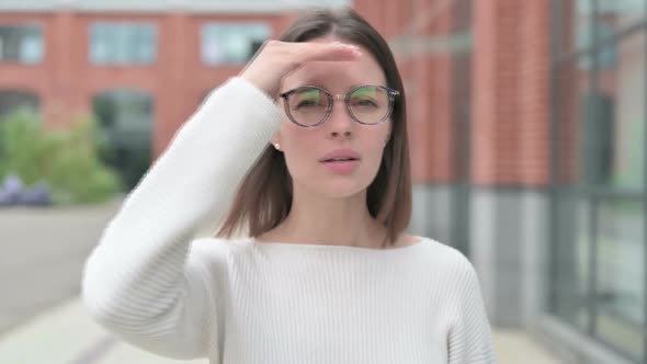 Young Woman Looking Around, Searching, Outdoor