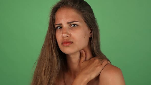 Gorgeous Young Woman Having Back Pain Posing on Chromakey 1080p