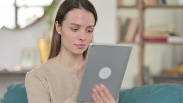 Young Woman Using Digital Tablet 