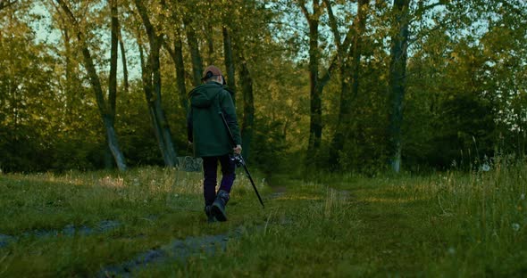 Little Boy is Walking to Fishing in Summer Morning Carrying Rod and Fish Trap  Prores