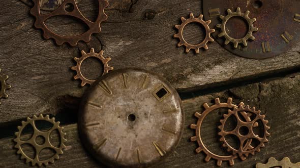 Rotating stock footage shot of antique and weathered watch faces - WATCH FACES 081