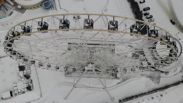 Rotating Ferris Wheel Tatarstan Kazan at Winter Aerial View Flying Over Top Down