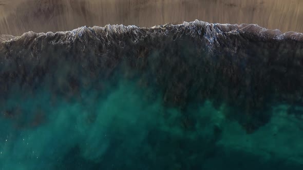 Top View of the Desert Beach on the Atlantic Ocean. Coast of the Island of Tenerife. Aerial Drone