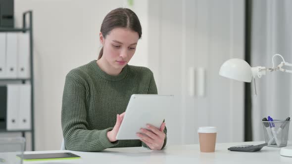 Young Woman Using Tablet 