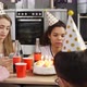 Young people checking smartphones on birthday party - VideoHive Item for Sale