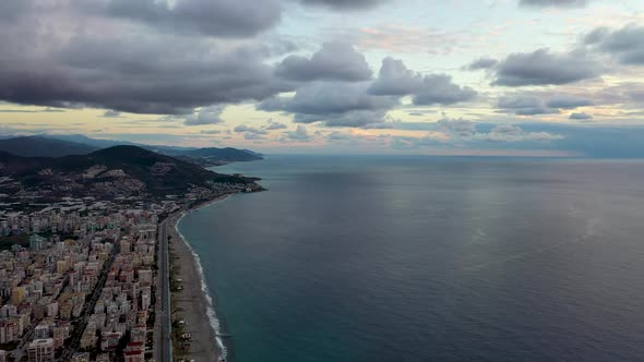 Cloudy Sunset Over the Sea Aerial View 4 K