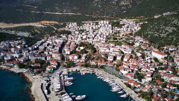 The top view from the drone of Kas resorts, bay, yahts, city in Mugla in Turkey