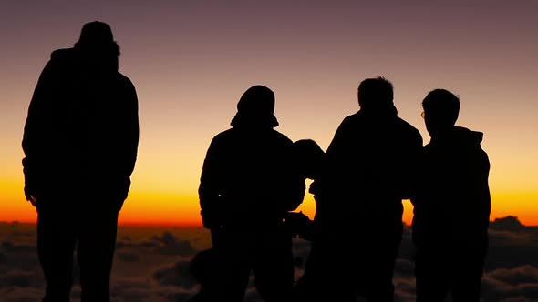 Men overlook Haleakala Crater in Maui