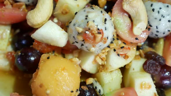 Close Up Footage of Thai Style Mix Exotic Fruits Somtum (Salad) with Sweet and Salty Dressing Includ