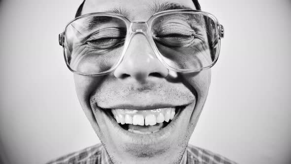 Laughing Nerdy Man in Glasses