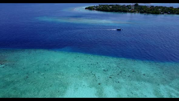 Aerial abstract of perfect coast beach vacation by clear ocean with white sand background of a daytr