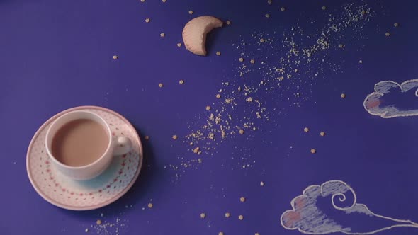 Someone Takes From a Table Made in the Form of a Night Sky a Mug of Coffee Closeup