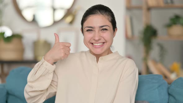 Indian Woman with Thumbs Up at Home 