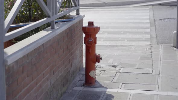 Red Fire Hydrant on the Sidewalk