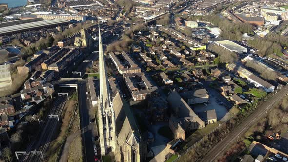 Flying backwards revealing Church of St Walburge, Preston on a winter sunny day