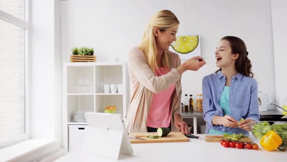 Happy Family Cooking Dinner at Home Kitchen