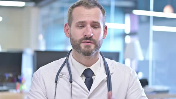 Portrait of Ambitious Young Doctor Having Conversation