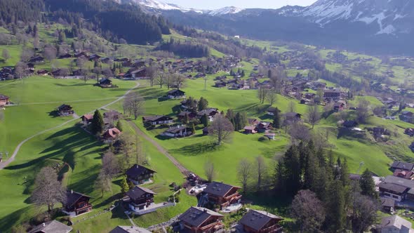 Drone Shot Over Swiss Town in the Mountains