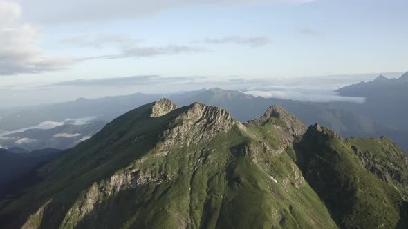 Aerial View Picturesque Natural Mountain Peak Cliff Terrain at Sun Light Blue Sky Organic Landscape