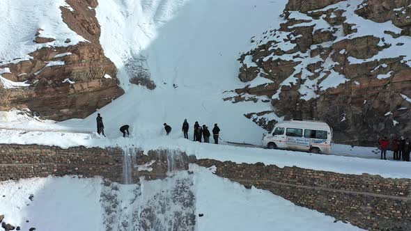 A Group of Travelers Clearing Roadblock By Removing Snow From Dangerous Roads of Spiti 